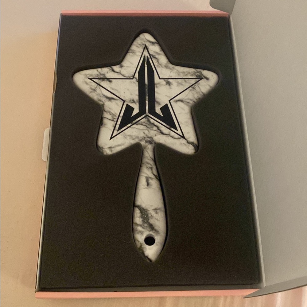Jeffrey Star hand mirror
